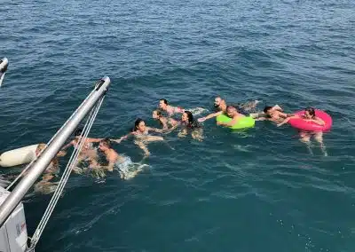 Bathing in the open sea from the boat